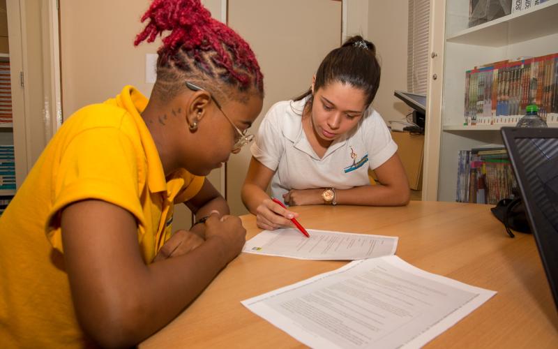 A Carribbean student being tutored